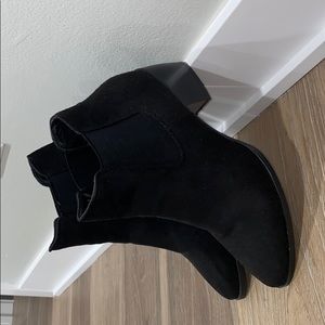 Black fashionable booties.